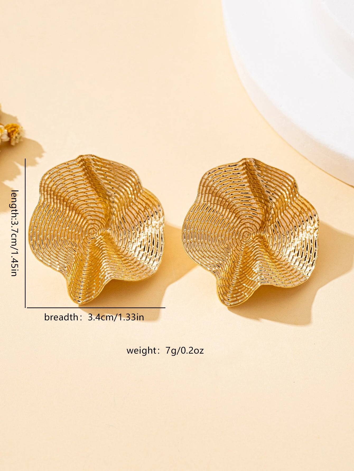 A Pair of Irregular Round Metal Stud Earrings Jewelry