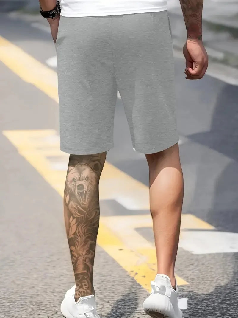 The new men's shorts for summer 2025 are casual sporty soft comfortable and breathable with 3D letter pattern printing