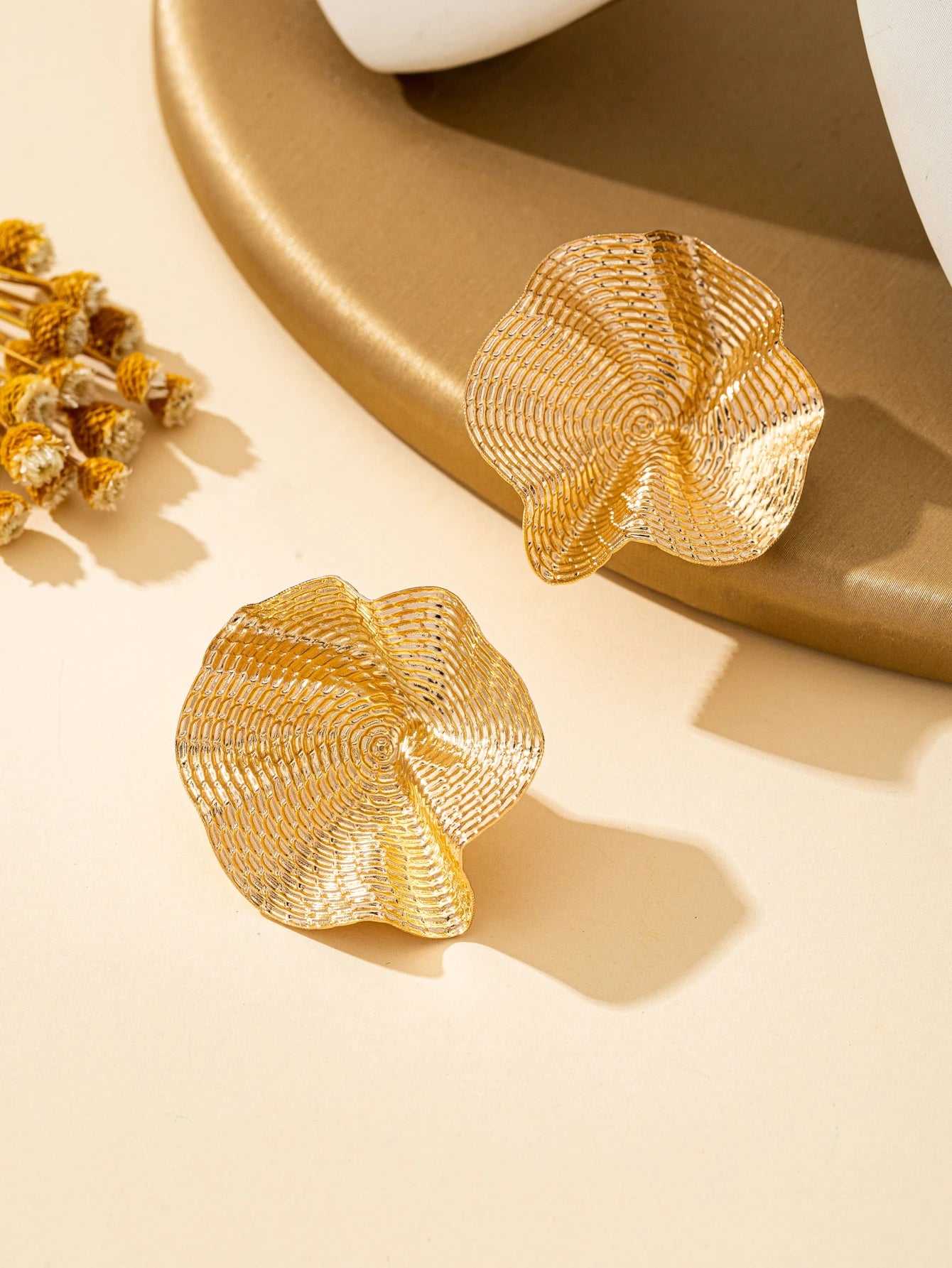 A Pair of Irregular Round Metal Stud Earrings Jewelry